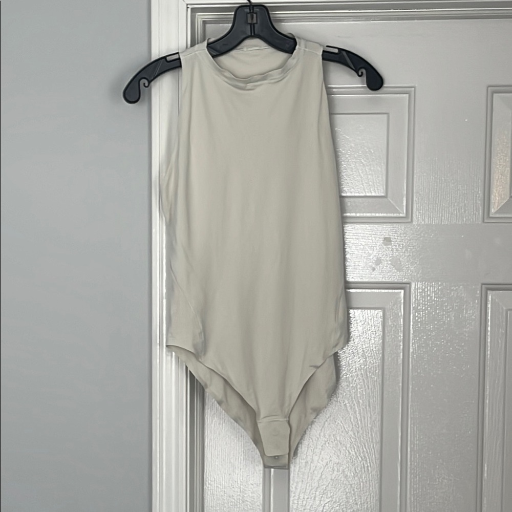 Lululemon Sleeveless Nulu Bone Bodysuit